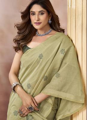 Sage green linen silk blend saree with floral woven pallu & tassels 2
