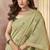 Sage green linen silk blend saree with floral woven pallu & tassels