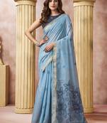 Light blue linen silk blend saree with floral woven pallu & tassels