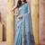 Light blue linen silk blend saree with floral woven pallu & tassels