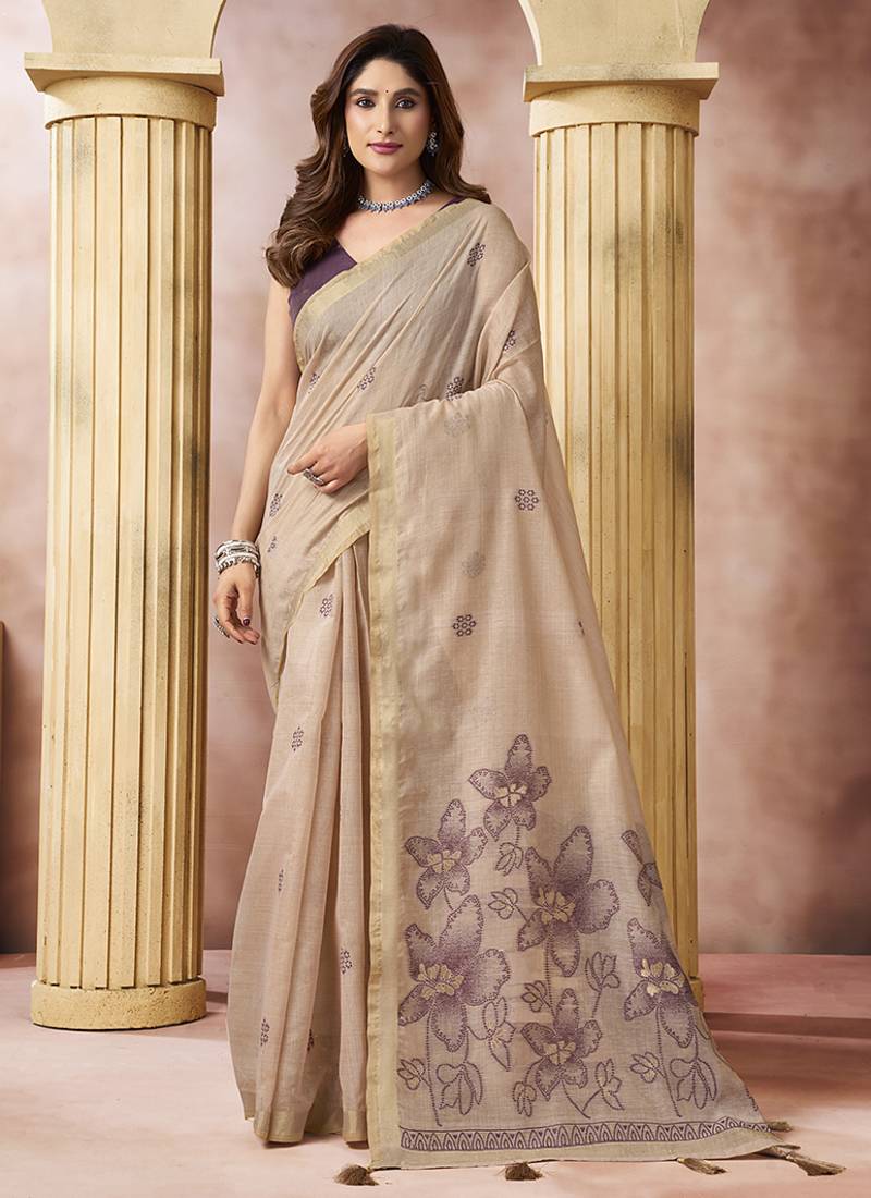 Beige linen silk blend saree with floral woven pallu & tassels