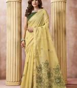 Pastel yellow linen silk blend saree with floral woven pallu & tassels