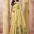 Pastel yellow linen silk blend saree with floral woven pallu & tassels