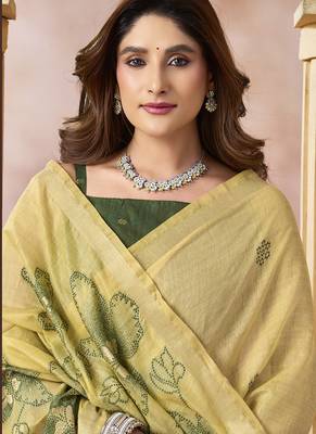Pastel yellow linen silk blend saree with floral woven pallu & tassels 2