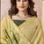 Pastel yellow linen silk blend saree with floral woven pallu & tassels