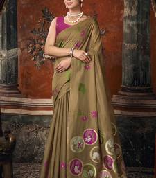 Brown cotton blend floral printed saree with multicolor floral motifs