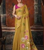 Mustard yellow cotton blend floral printed saree with multicolor floral motifs
