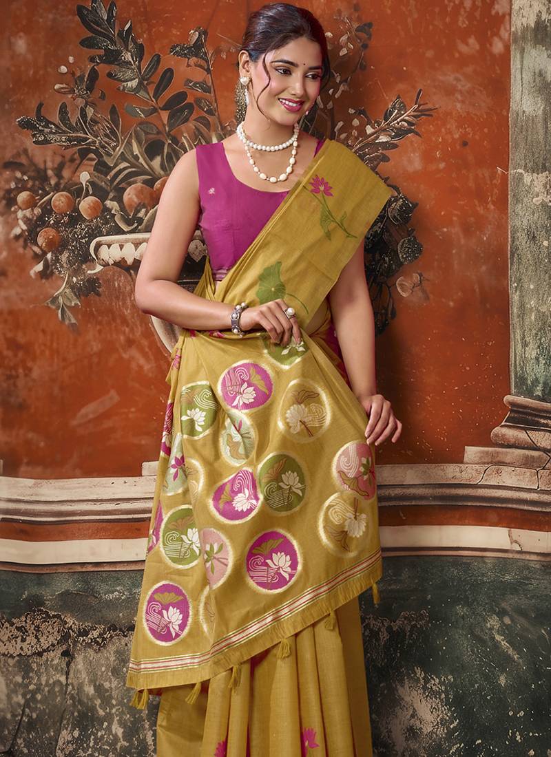 Mustard yellow cotton blend floral printed saree with multicolor floral motifs