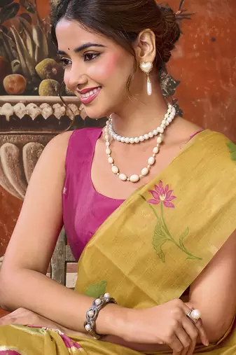 Mustard yellow cotton blend floral printed saree with multicolor floral motifs