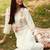 White Floral Yoke Design Tie-Up Neck Straight Kurta With Trousers & Dupatta