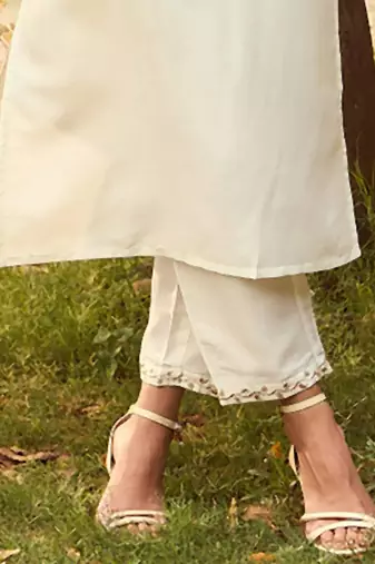 White Floral Yoke Design Tie-Up Neck Straight Kurta With Trousers & Dupatta