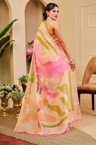 Peach shimmer printed zari saree with unstitched blouse piece.