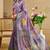 Purple shimmer printed zari saree with unstitched blouse piece.