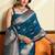 Teal blue silk blend saree with zari weaving & leaf motifs