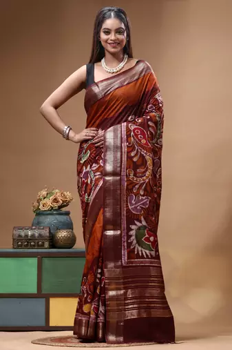 rust orange & maroon hand-painted silk blend saree with floral paisley print & golden zari border