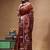 rust orange & maroon hand-painted silk blend saree with floral paisley print & golden zari border
