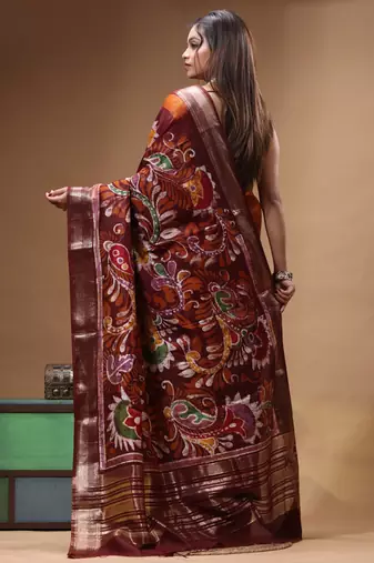 rust orange & maroon hand-painted silk blend saree with floral paisley print & golden zari border