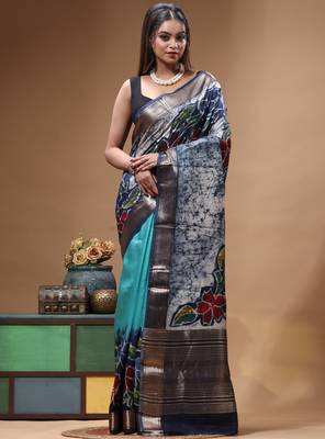 sky blue & navy blue hand-painted silk blend saree with floral batik print & golden zari border 1