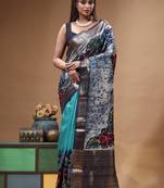sky blue & navy blue hand-painted silk blend saree with floral batik print & golden zari border
