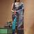 sky blue & navy blue hand-painted silk blend saree with floral batik print & golden zari border