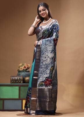 sky blue & navy blue hand-painted silk blend saree with floral batik print & golden zari border 2