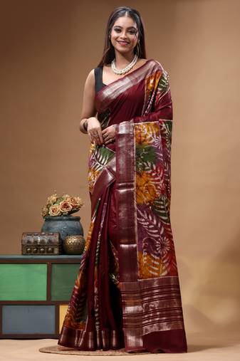 elegant brown silk blend saree with hand-painted floral art & golden zari border