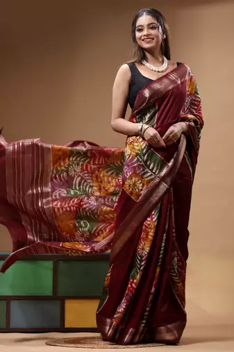 elegant brown silk blend saree with hand-painted floral art & golden zari border