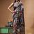elegant black hand-painted silk blend saree with floral batik print & golden zari border