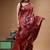 elegant maroon hand-painted silk blend saree with floral batik print & rich golden zari border