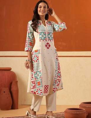Women Printed Regular Kurta with Trousers 1