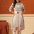 Women Printed Regular Kurta with Trousers