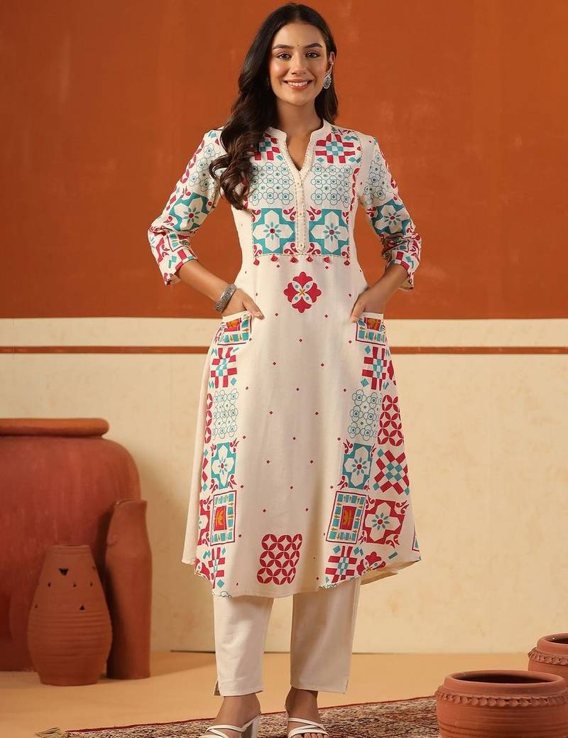 Women Printed Regular Kurta with Trousers