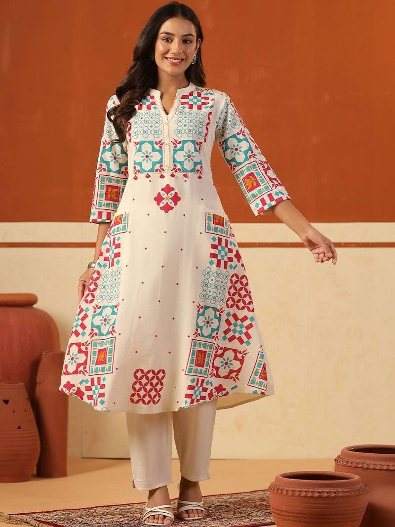 Women Printed Regular Kurta with Trousers