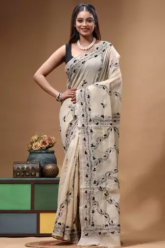 off-white cotton blend saree with black floral embroidered stitched saree