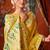 Mustard yellow tissue silk blend saree with floral zari border