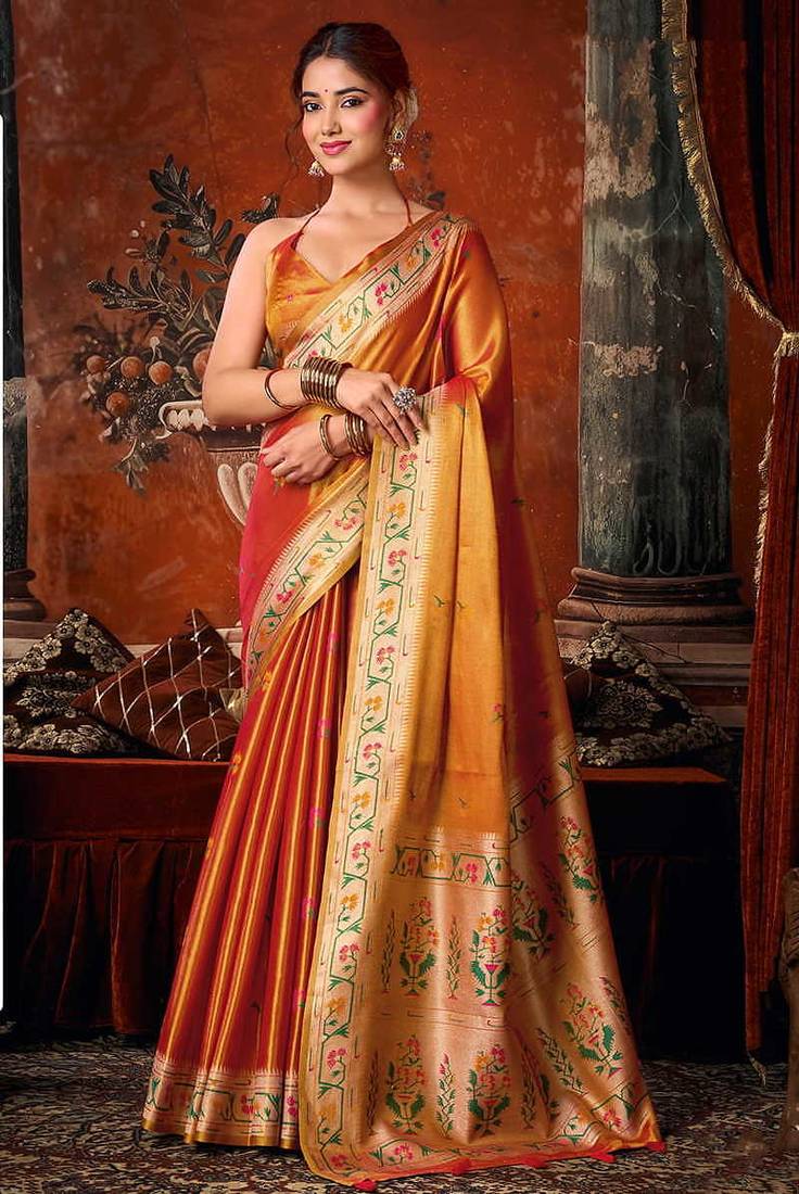 Orange tissue silk blend saree with floral zari border