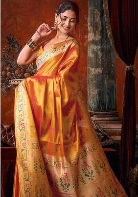 Orange tissue silk blend saree with floral zari border 2