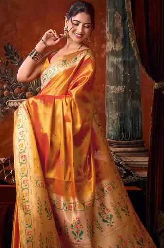 Orange tissue silk blend saree with floral zari border