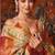 Orange tissue silk blend saree with floral zari border