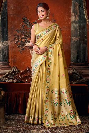 Beige tissue silk blend saree with floral zari border