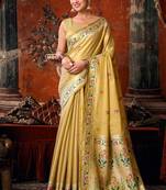 Beige tissue silk blend saree with floral zari border