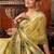 Beige tissue silk blend saree with floral zari border