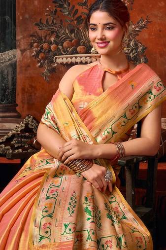 Peach tissue silk blend saree with floral zari border