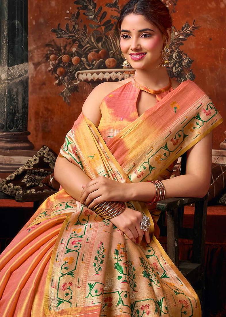 Peach tissue silk blend saree with floral zari border