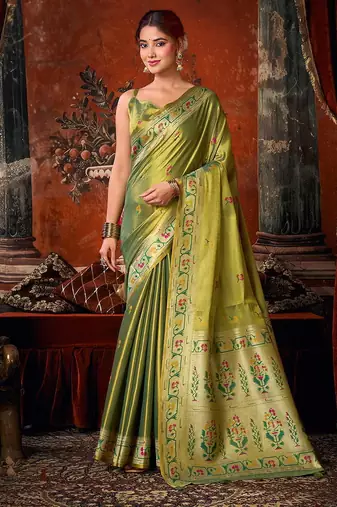 Olive green tissue silk blend saree with floral zari border