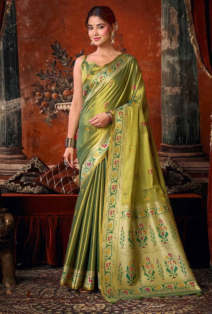Olive green tissue silk blend saree with floral zari border