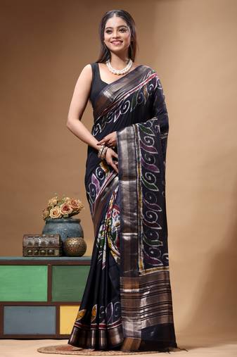 elegant black silk blend saree with hand-painted floral art & rich golden zari border