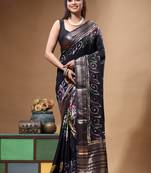 elegant black silk blend saree with hand-painted floral art & rich golden zari border