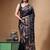 elegant black silk blend saree with hand-painted floral art & rich golden zari border