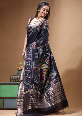elegant black silk blend saree with hand-painted floral art & rich golden zari border 2